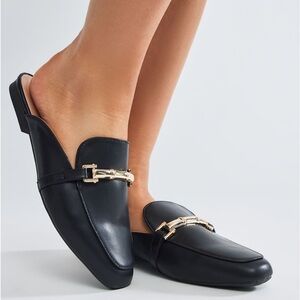 BRAND NEW IN THE BOX Black loafers